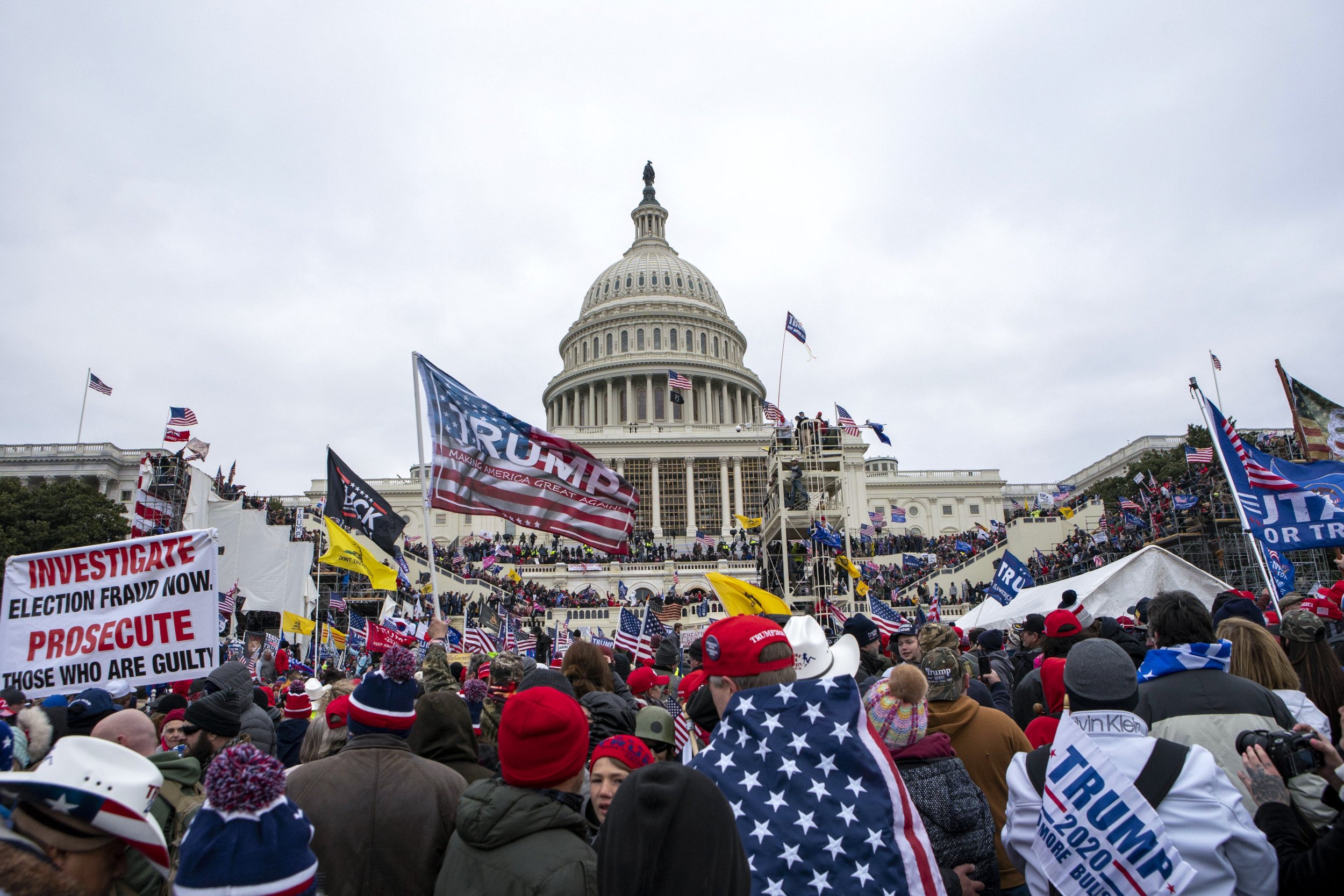 Man Charged With Using Large 'Trump' Sign as Weapon During Jan. 6 Riot