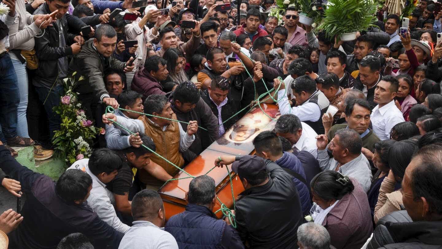 Burial held for Catholic priest and Indigenous peace activist killed in southern Mexico