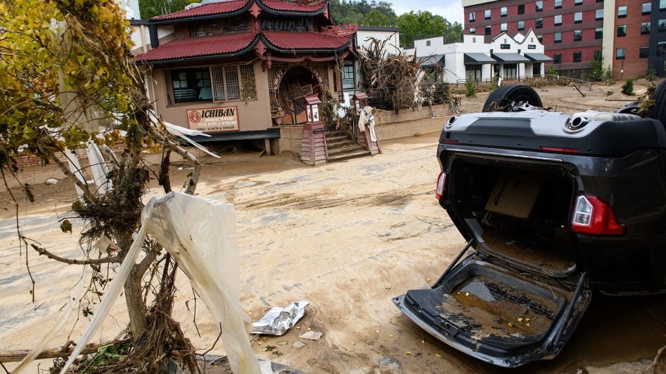 People moved to Asheville to escape extreme weather. They forgot its tragic history.