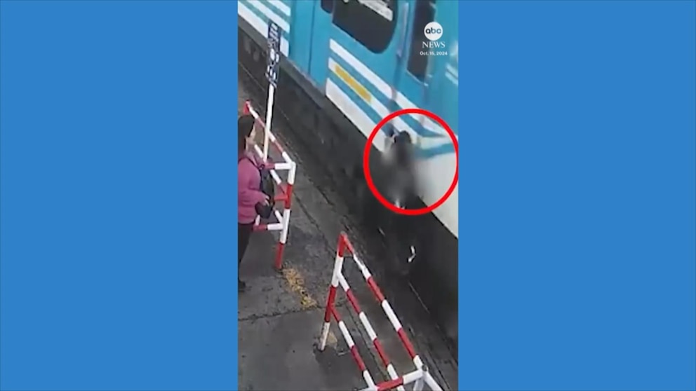 WATCH: Man almost hit by train while staring at phone