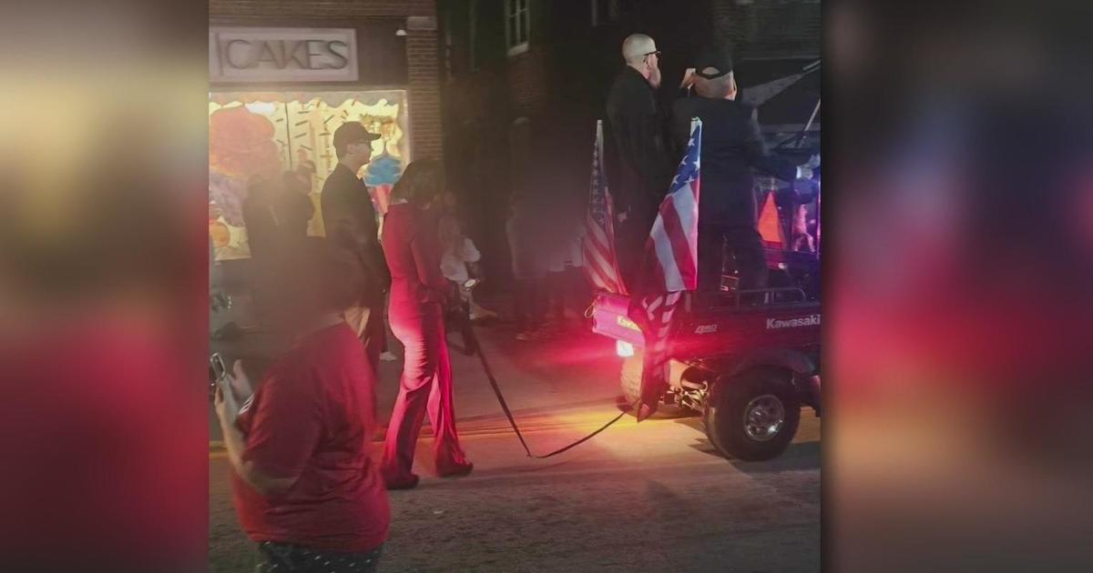 Kamala Harris depicted as chained up behind golf cart during Pennsylvania Halloween parade