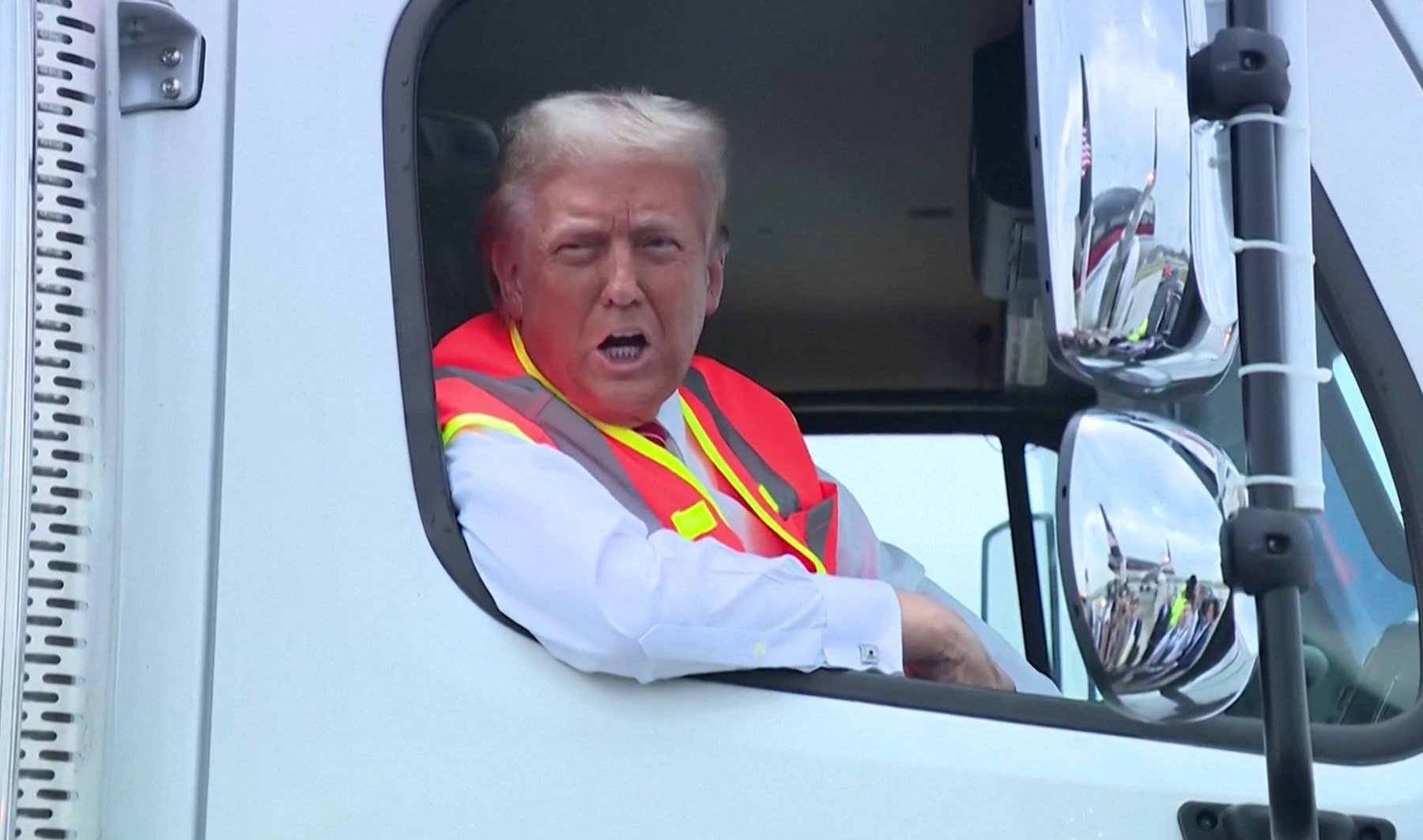 Donald Trump boards garbage truck in response to Biden comment