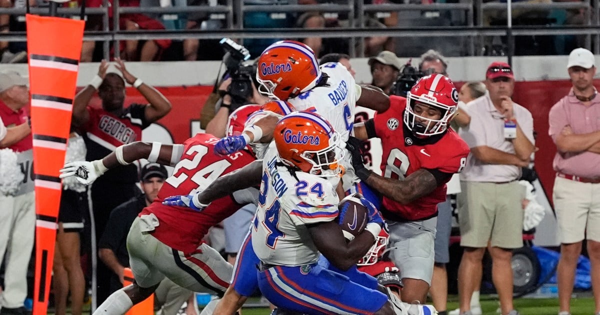 Jacksonville deputies under review after videos of violent fracas with fans at Florida-Georgia football game go viral