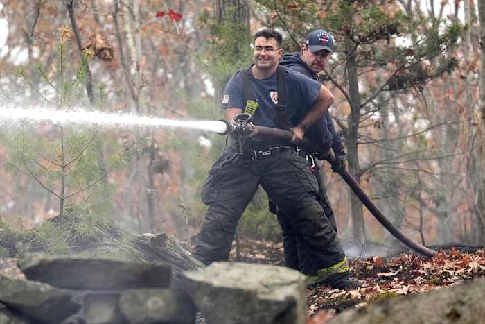 Massachusetts firefighters continue to battle stubborn brush fires across state