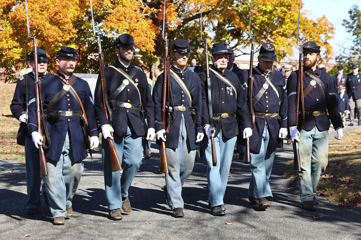 Remains of nearly 30 Civil War veterans found in a funeral home's storage are laid to rest