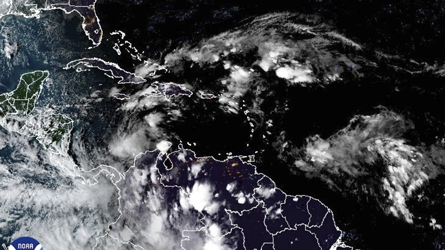 Tropical Storm Rafael chugs past Jamaica as Cuba prepares for another hurricane hit