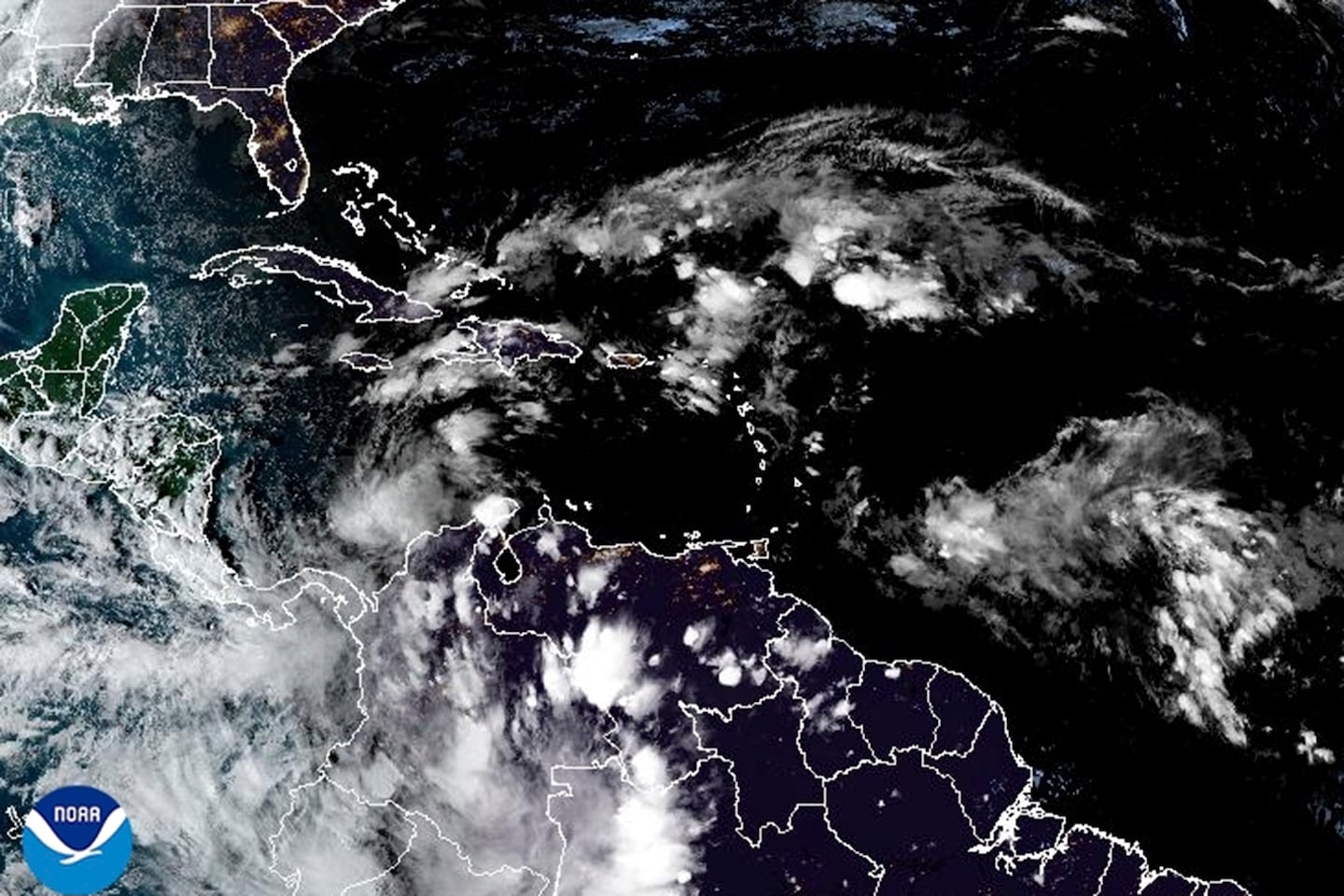 Tropical Storm Rafael spins toward the Cayman Islands as Cuba prepares for hurricane hit