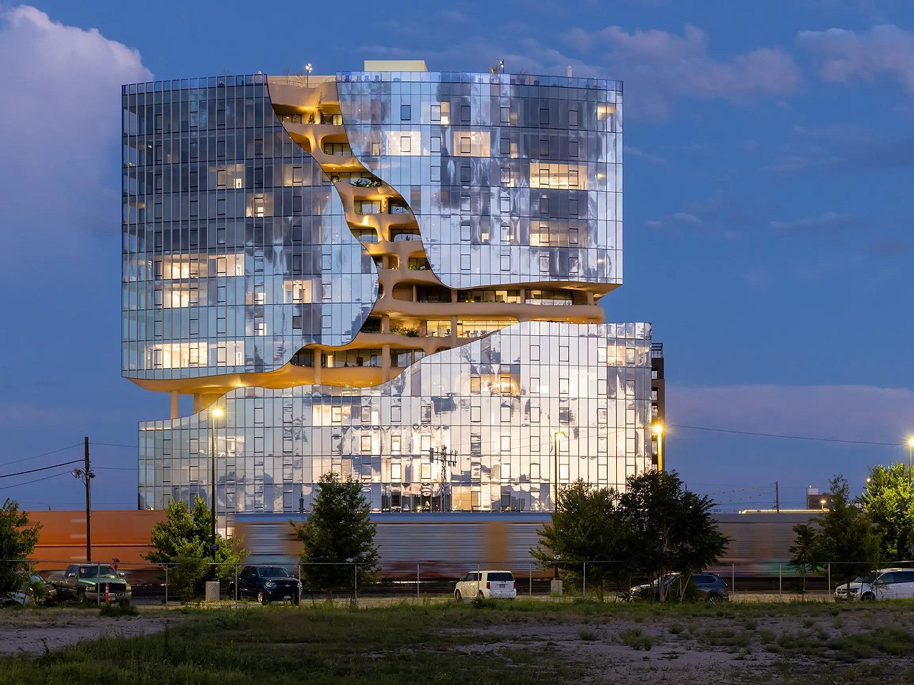 MAD Designs An Incredible High-Rise Featuring A Facade With A Walk-Through ‘Canyon’ Area