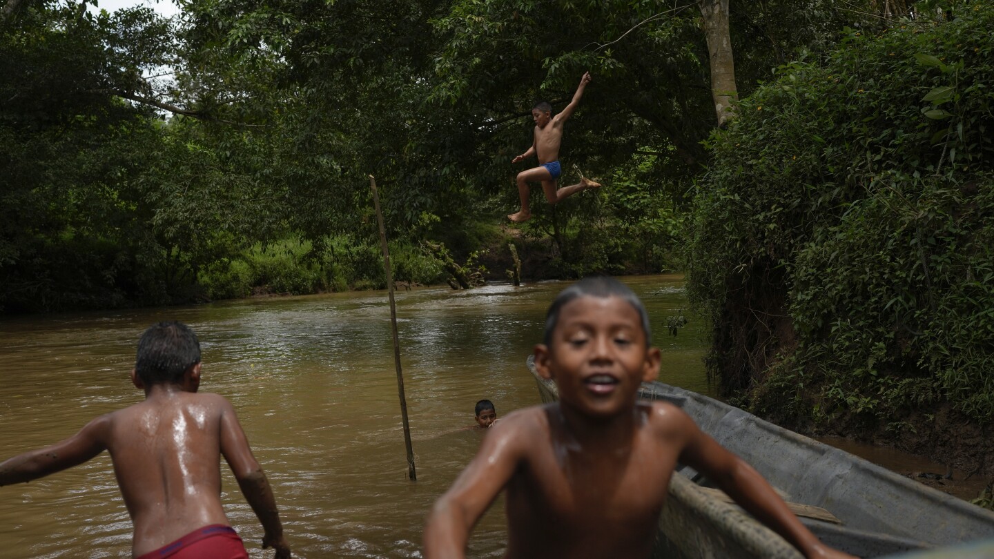 Villagers are wary of plans to dam a river to ensure Panama Canal's water supply