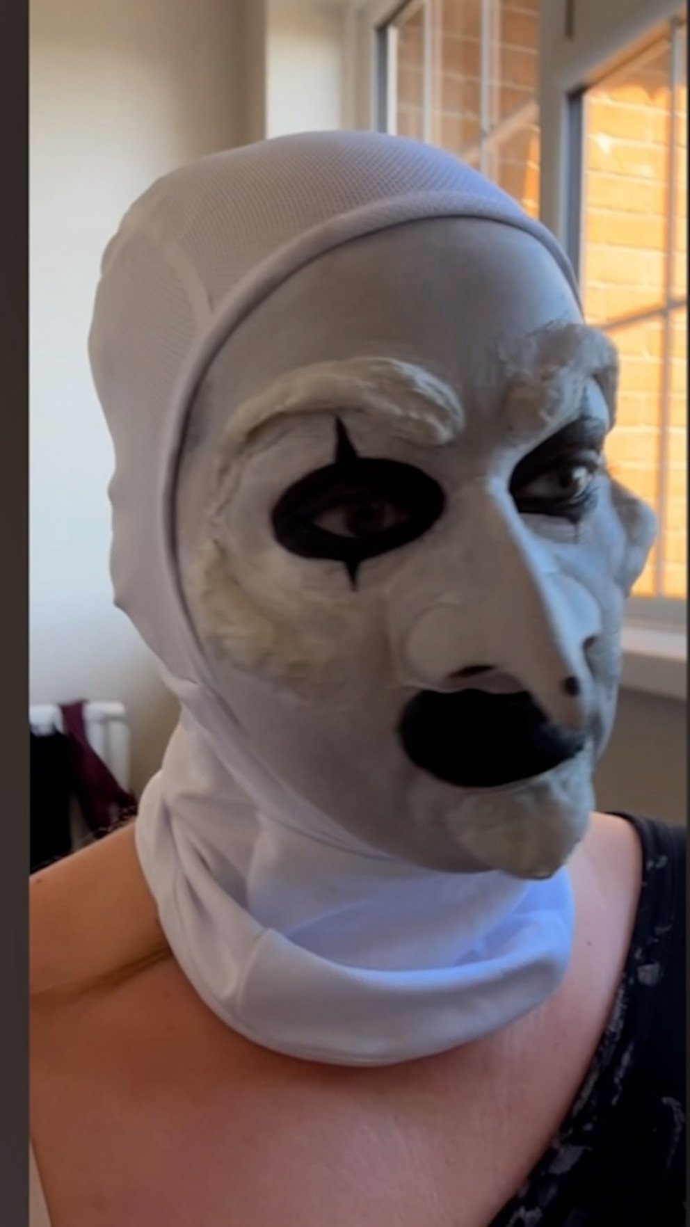 WATCH: She was practicing her Halloween makeup — then the doorbell rang