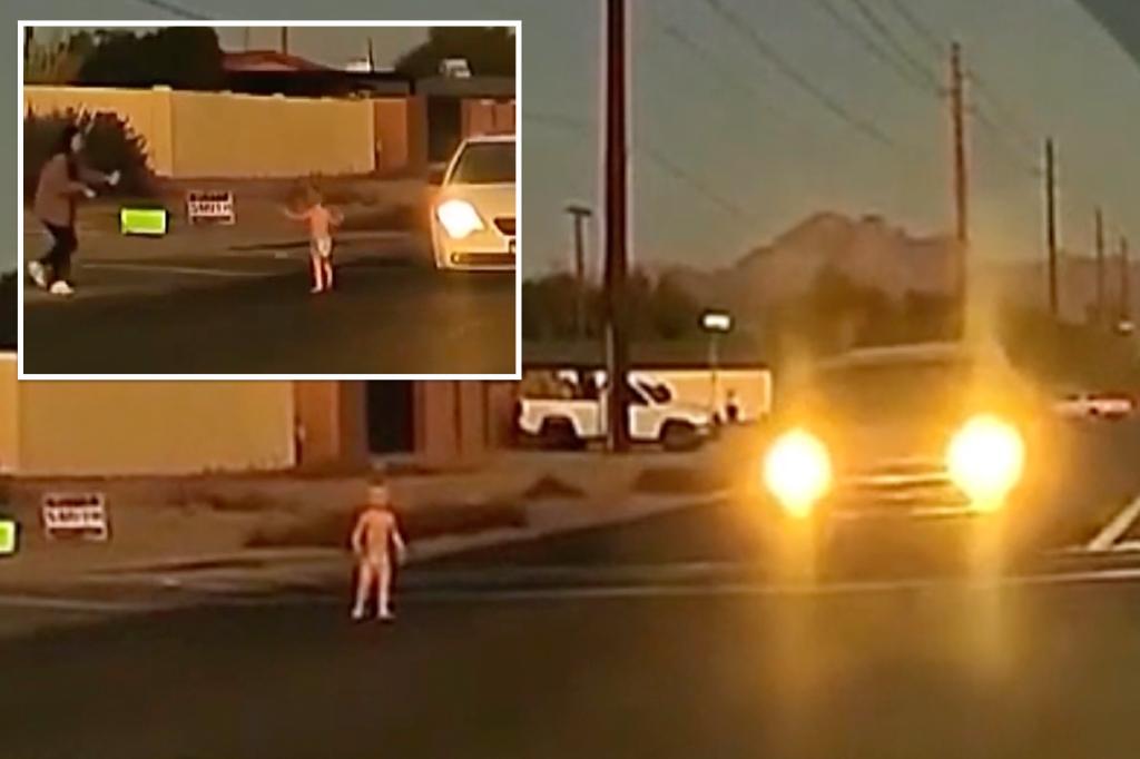 Dashcam footage shows car swerve to miss runaway toddler