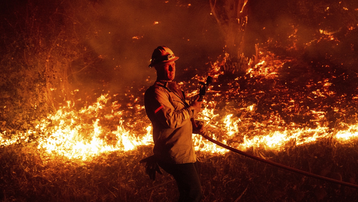 Strong winds fuel rapid spread of wildfires in Southern California