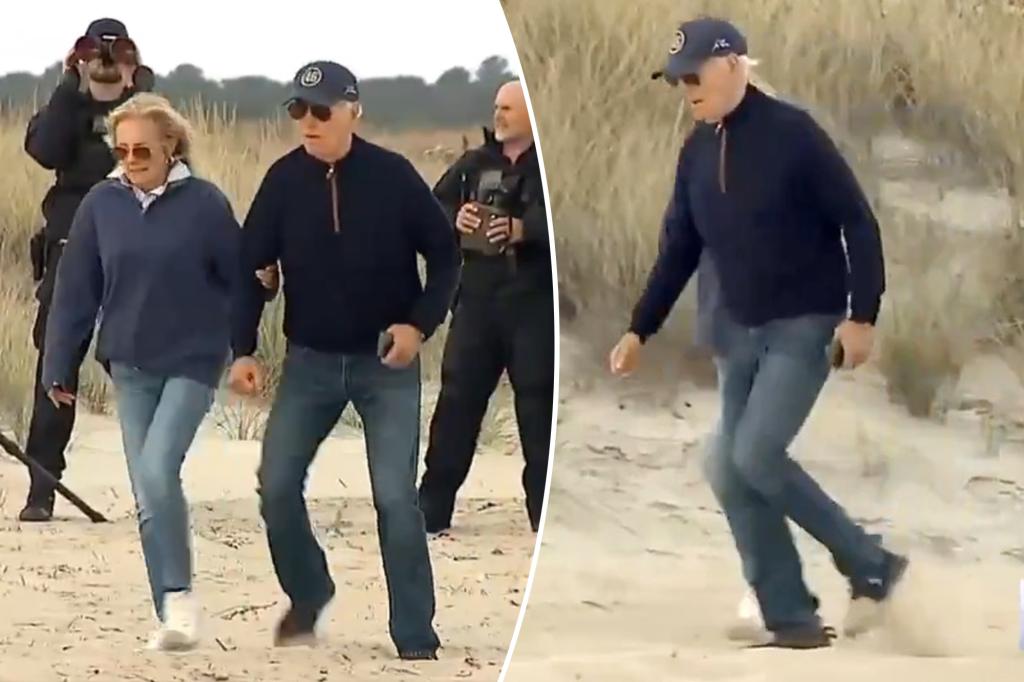 Biden stumbles multiple times, needs assist from Jill as he struggles to walk on sandy Delaware beach