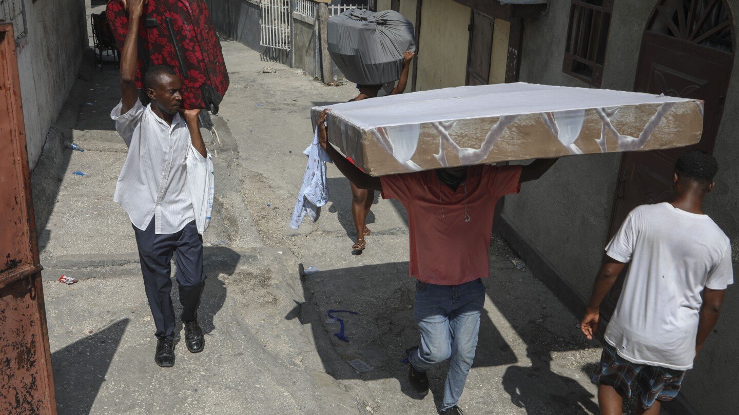 Masses flee homes in Haiti as gangs ratchet up violence amid political turmoil