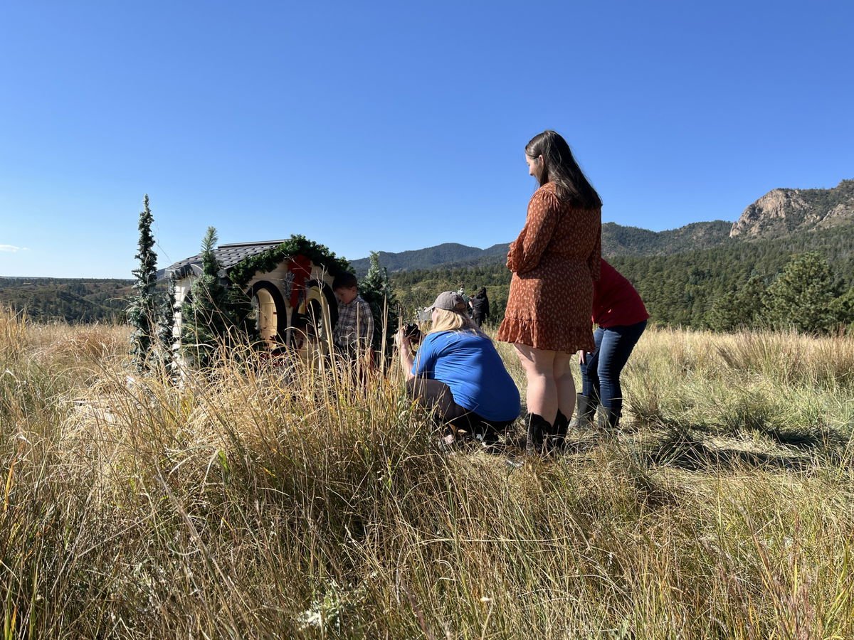 THE MILITARY FAMILY: Volunteer photo brigade seals family memories during holiday deployments