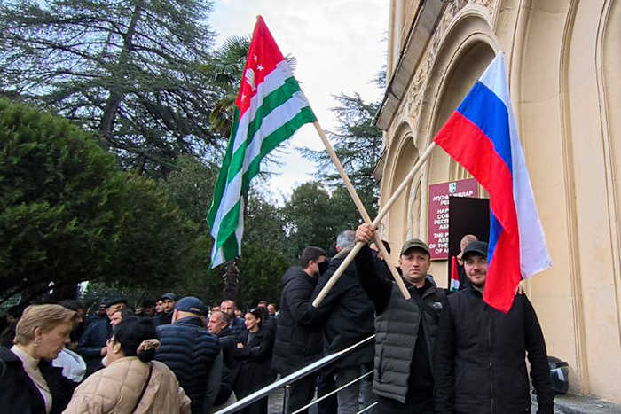 Protesters in separatist Georgian region occupy government buildings, calling for leader's ouster