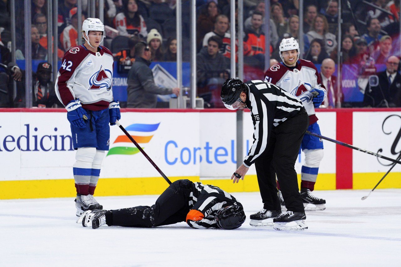 NHL referee Mitch Dunning violent collision with Josh Manson