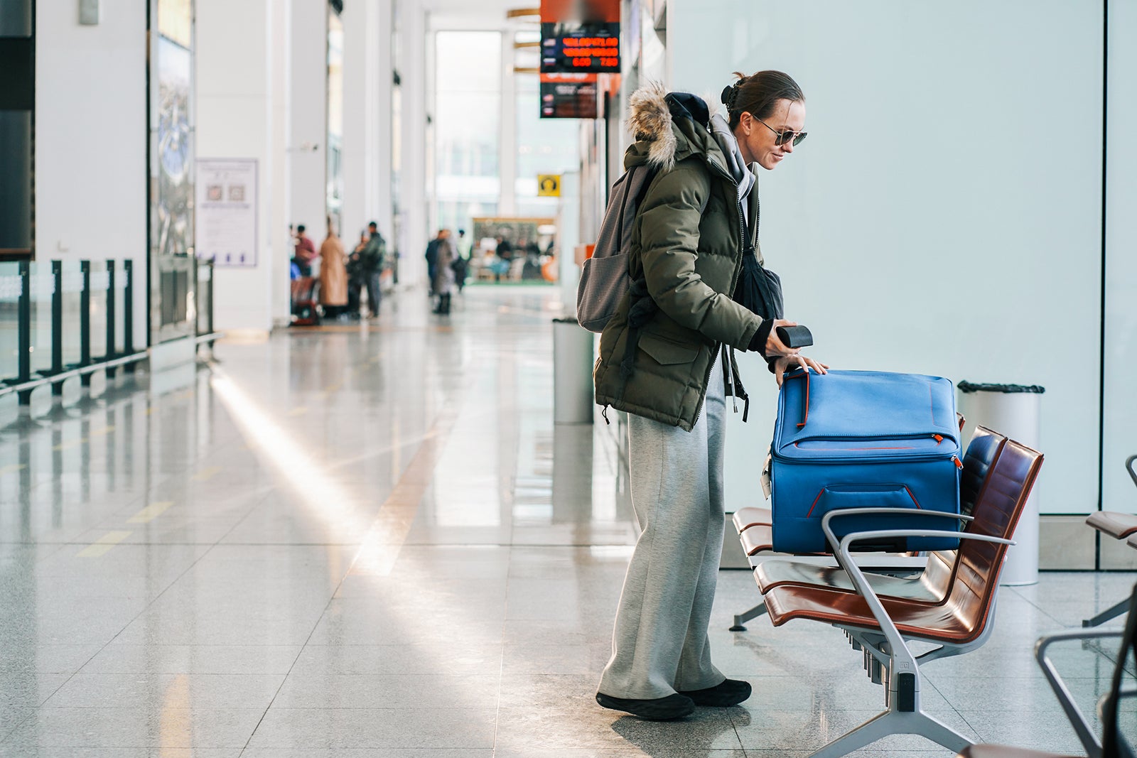 Don’t lug your winter coat on a beach vacation — check it at this airport