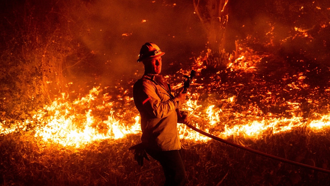 Strong winds fuel rapid spread of wildfires in Southern California