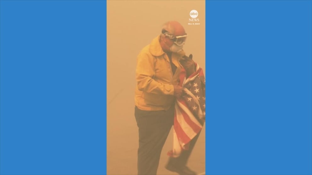 WATCH: Firefighter saves American flag from California wildfire