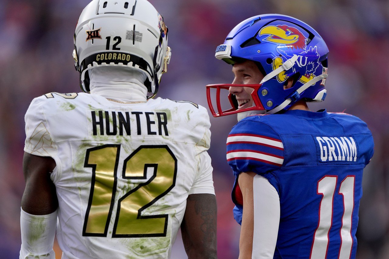 Devin Neal scores 4 times, Kansas beats No. 16 Colorado 37-21