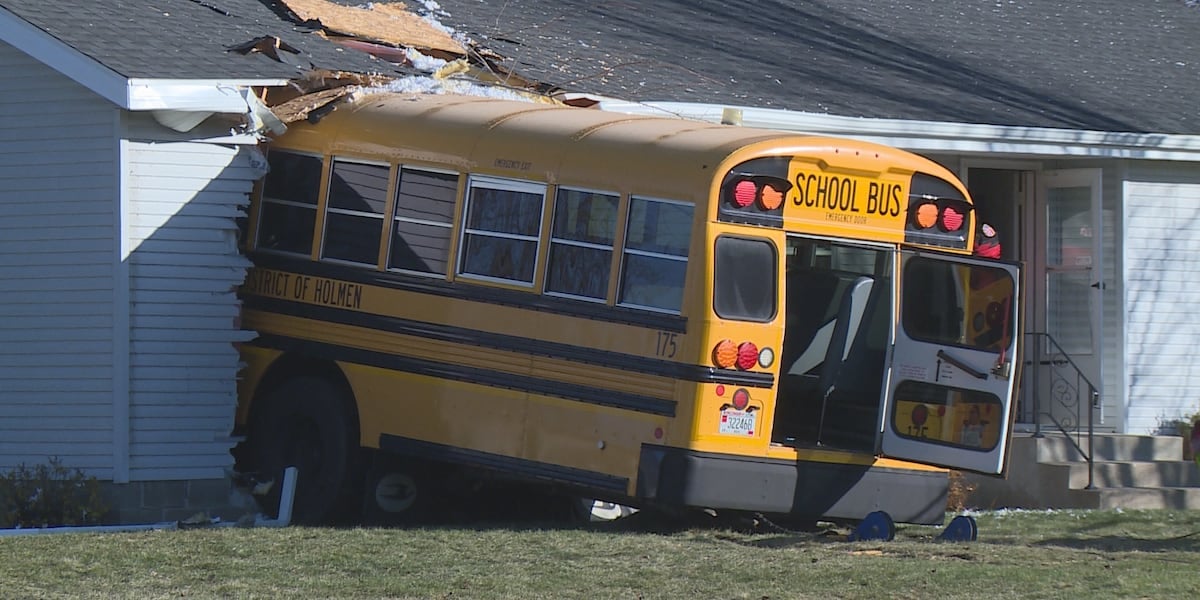 Holmen school bus crashes into home, no kids on board