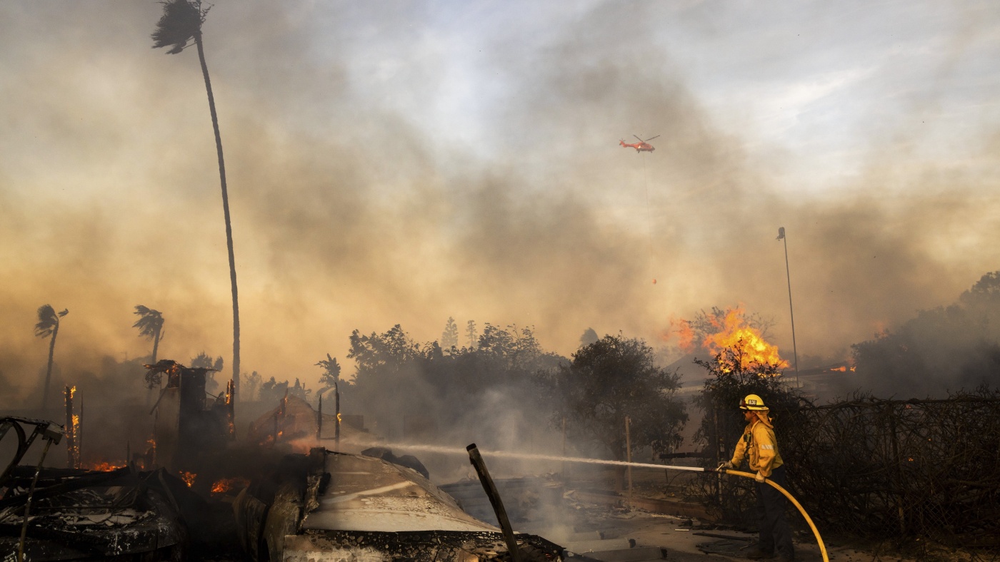 Slower winds aid firefighters battling destructive blaze in Southern California