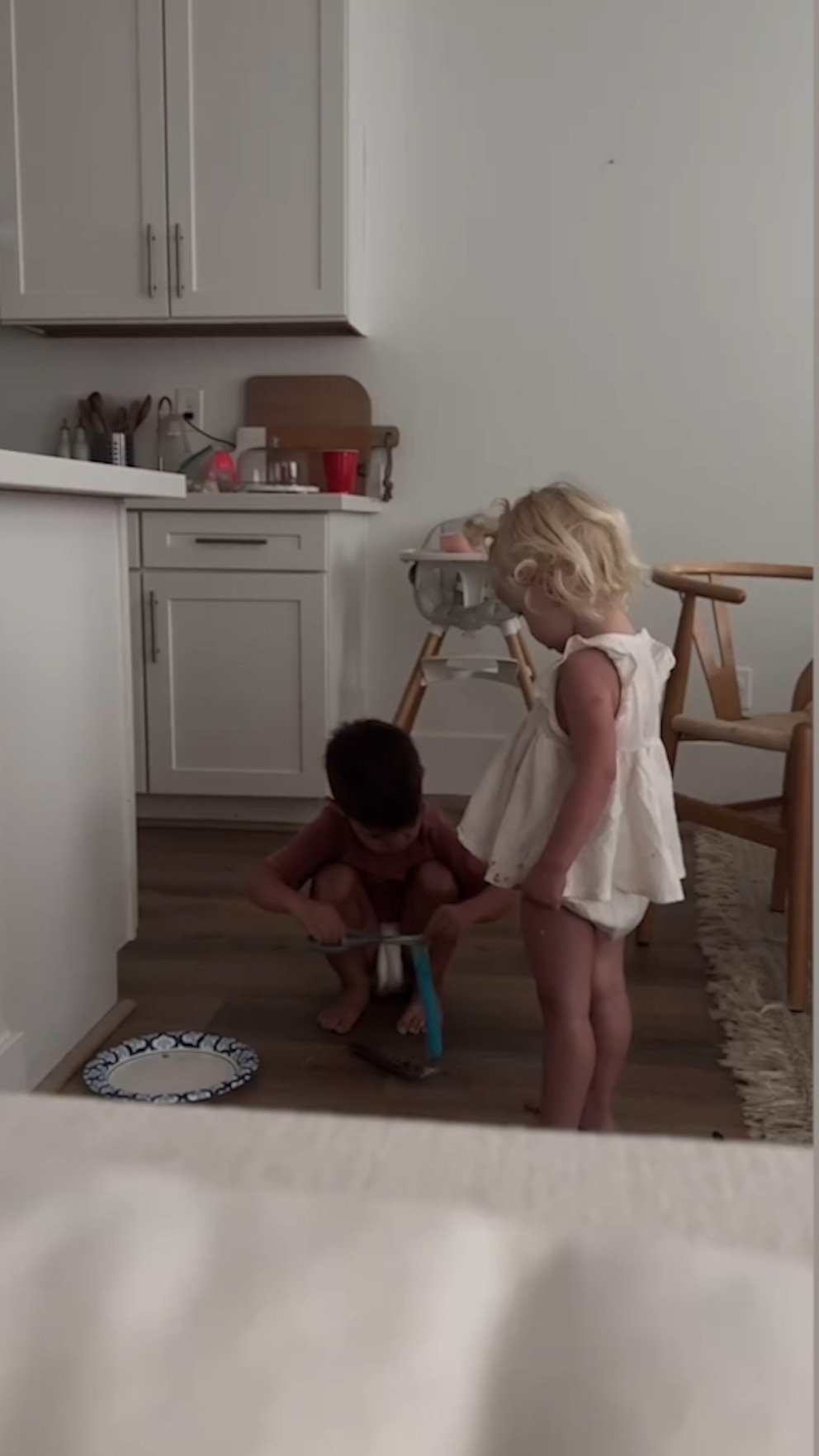 WATCH: Brother and sister sneak into kitchen to steal popsicles