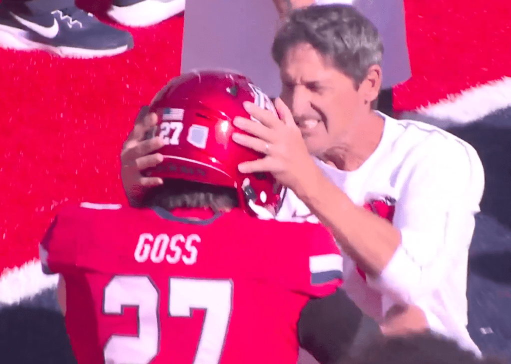 Arizona coach bloodied after head-butting helmeted player