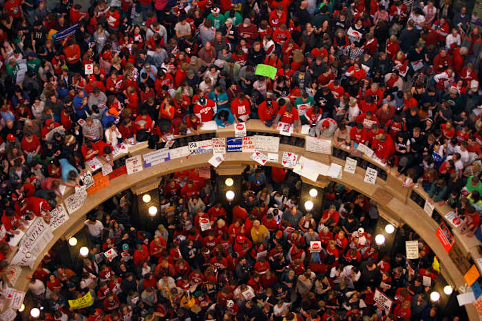 Unions score a major win in Wisconsin with a court ruling restoring collective bargaining rights