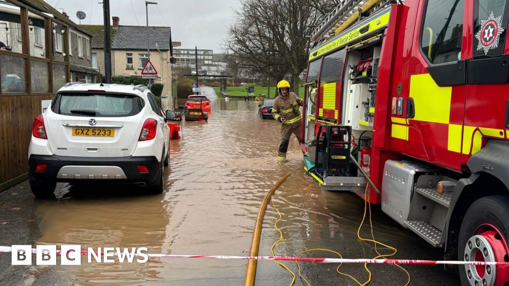 Homes flooded and travel disrupted by Storm Bert