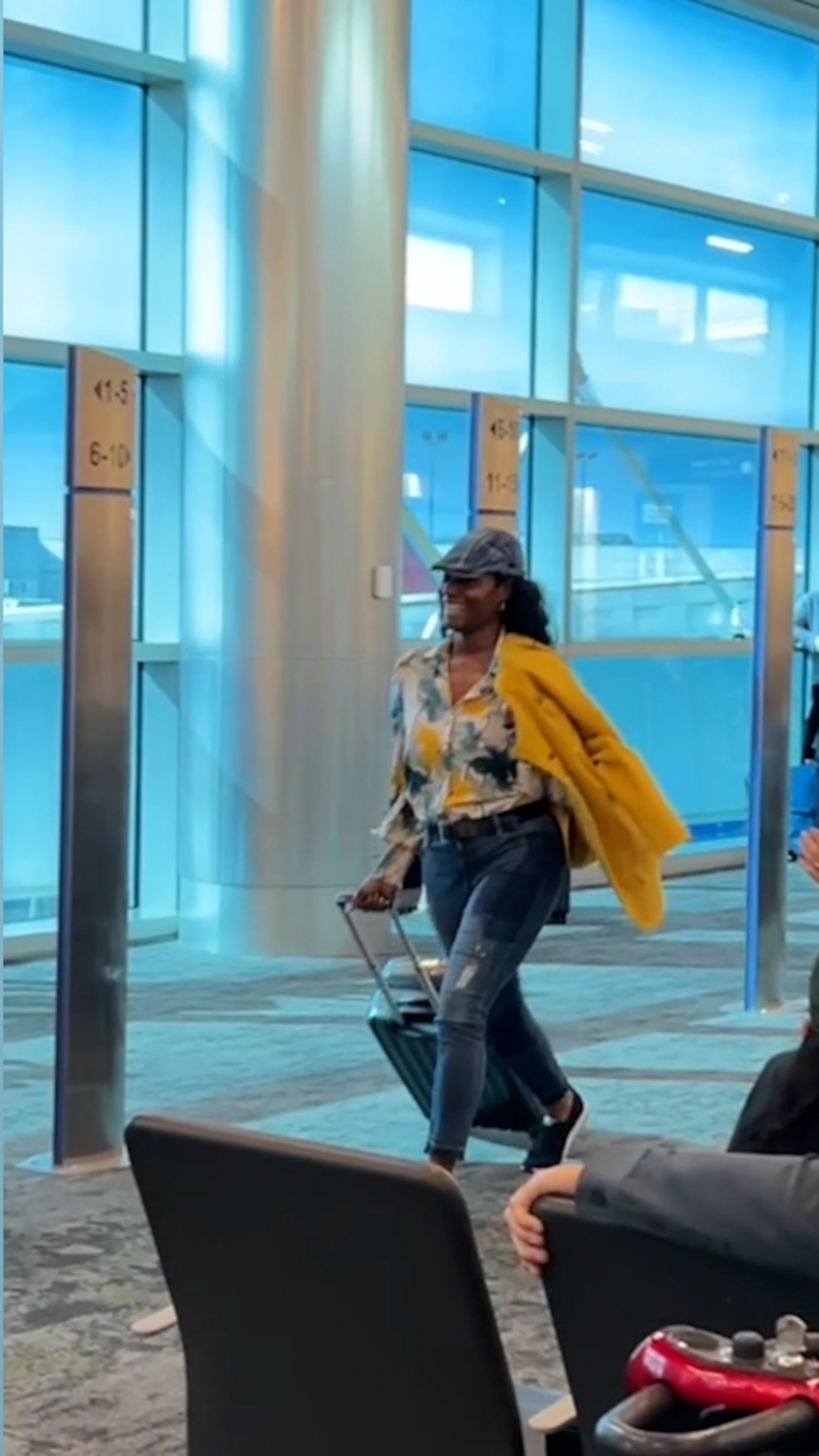 WATCH: Holiday travelers find ways to have fun at the airport