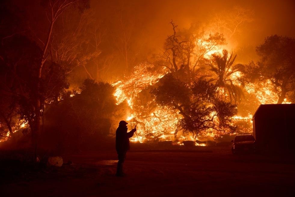 Wind-driven Malibu wildfire burns homes, forces evacuations