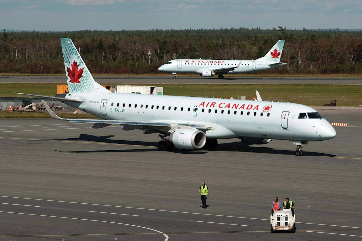 Yukon couple shuffled to multiple airports by Air Canada awarded $10,000 in court