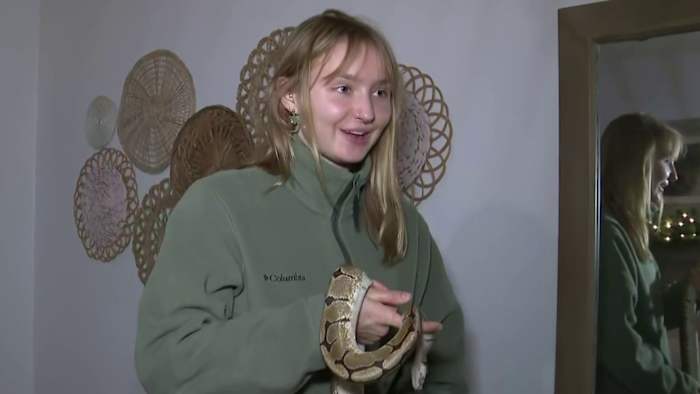 Canton woman reunited with lost emotional support python after winter crash