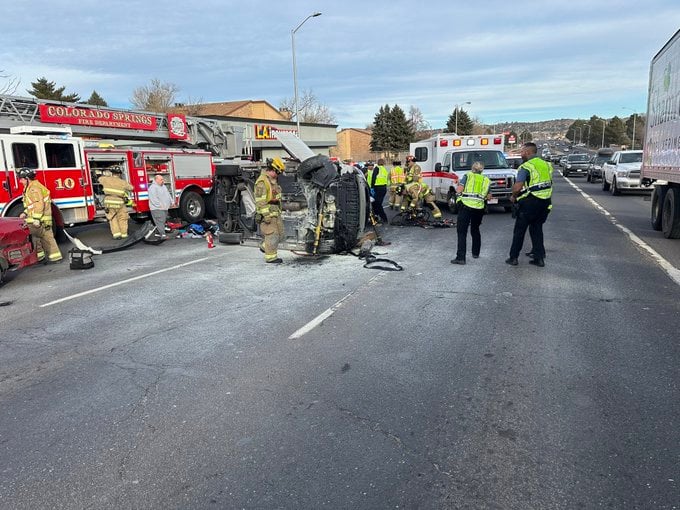 Car flips, catches on fire at North Academy and North Carefree