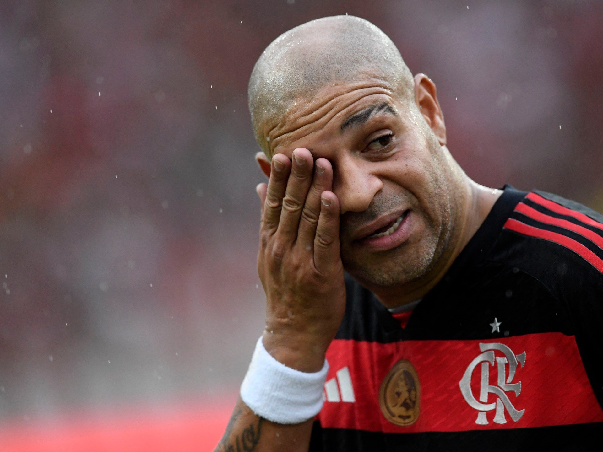 Former Brazil and Milan star striker Adriano bids farewell to football