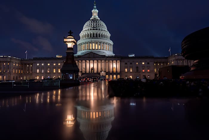 Biden signs bill that averts a government shutdown and brings a close to days of Washington upheaval