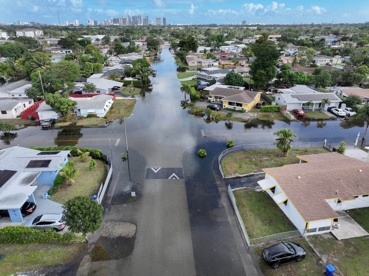 Flood-soaked homeowners face a costly choice: raise or raze