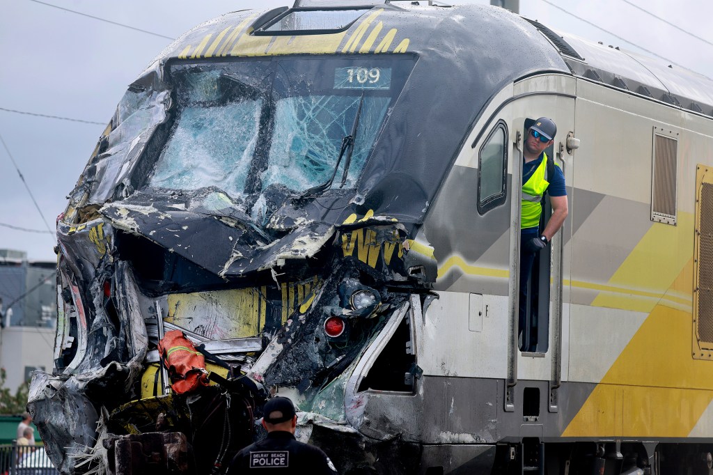 15 hurt in Florida when train hits fire truck on tracks