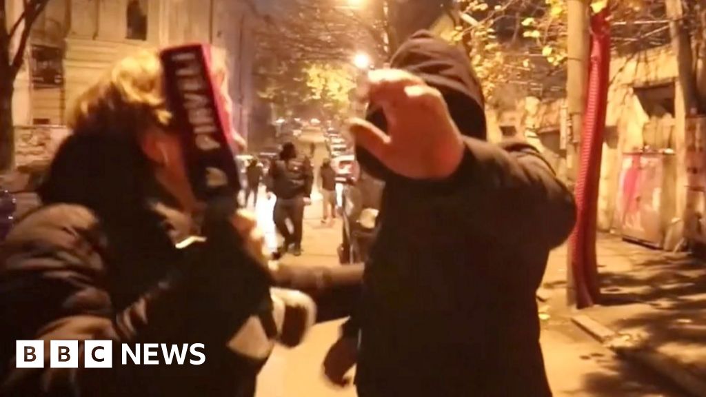 Moment Georgian press attacked by masked men