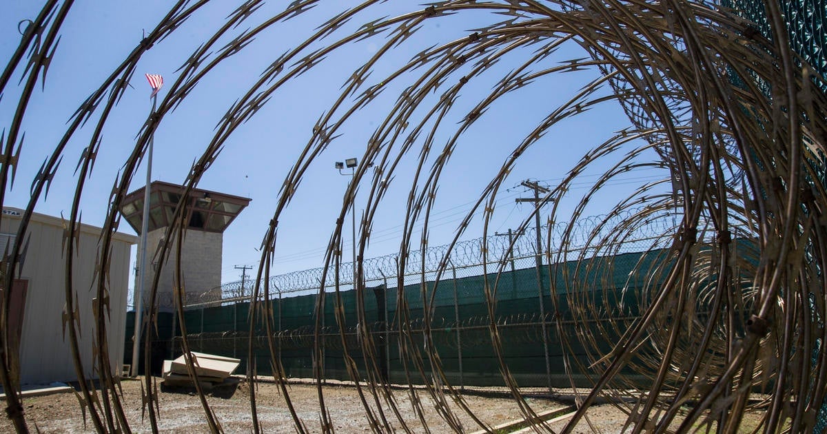 U.S. releases 2 prisoners from Guantánamo, leaving 27 still held at American camp in Cuba