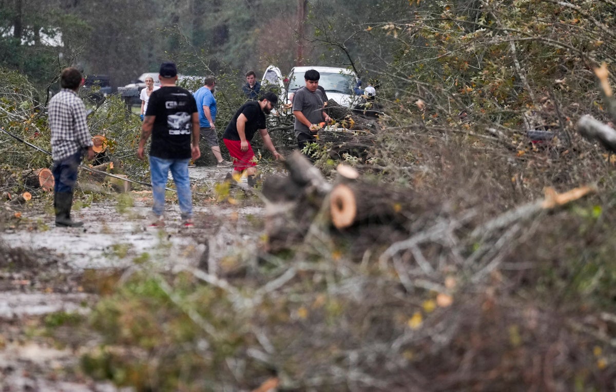 Cheerleader, mother of eight among four killed as tornadoes leave trail of destruction across South