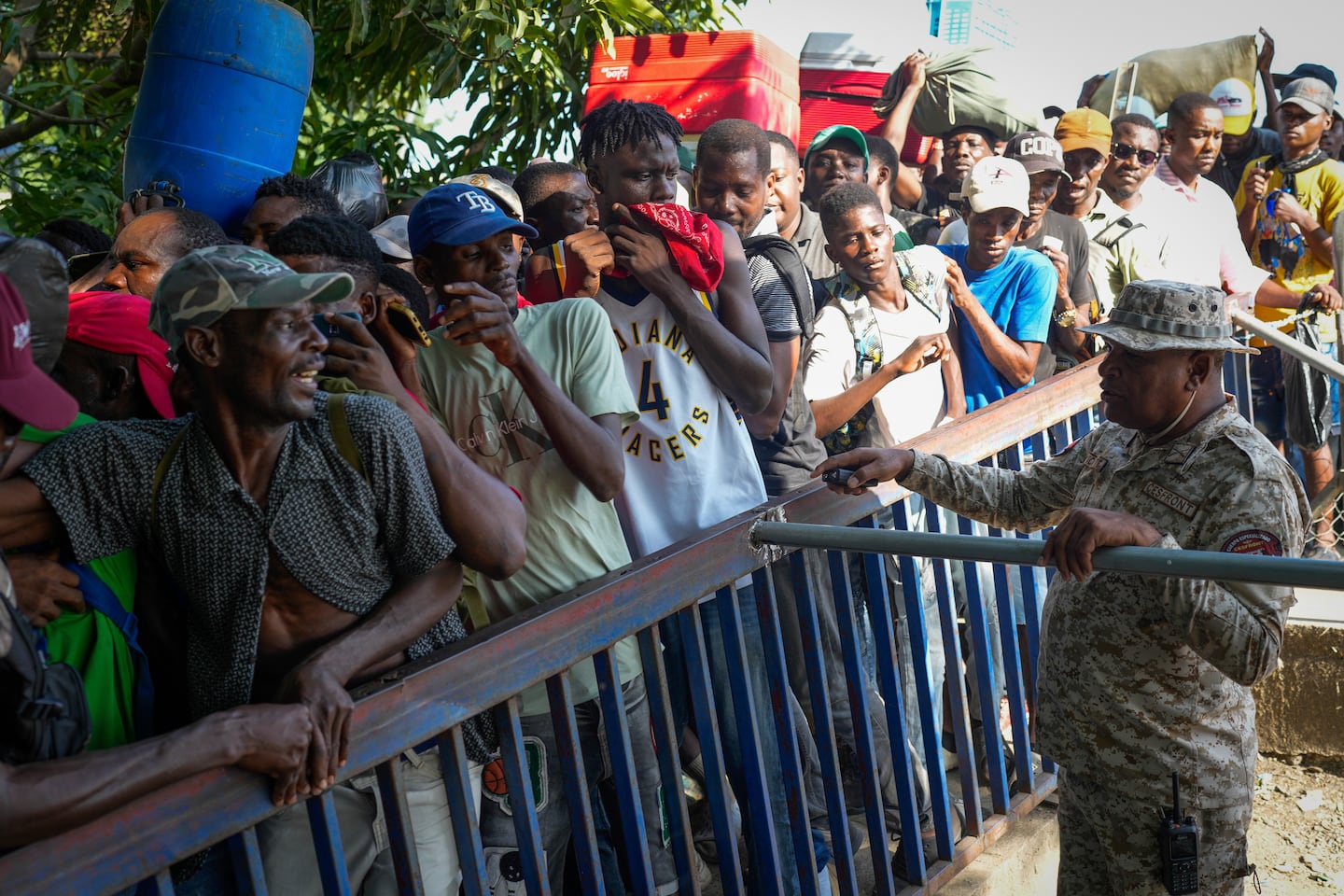 Desperate Haitians who fled to the Dominican Republic are being sent back in cages