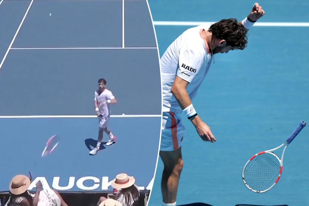 Tennis star Cameron Norrie hits fan with racket in stunning scene