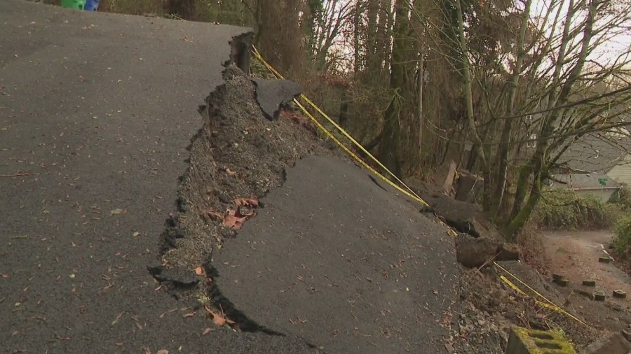 ‘It’s coming down’: Portland house on edge of hill above another home after landslide