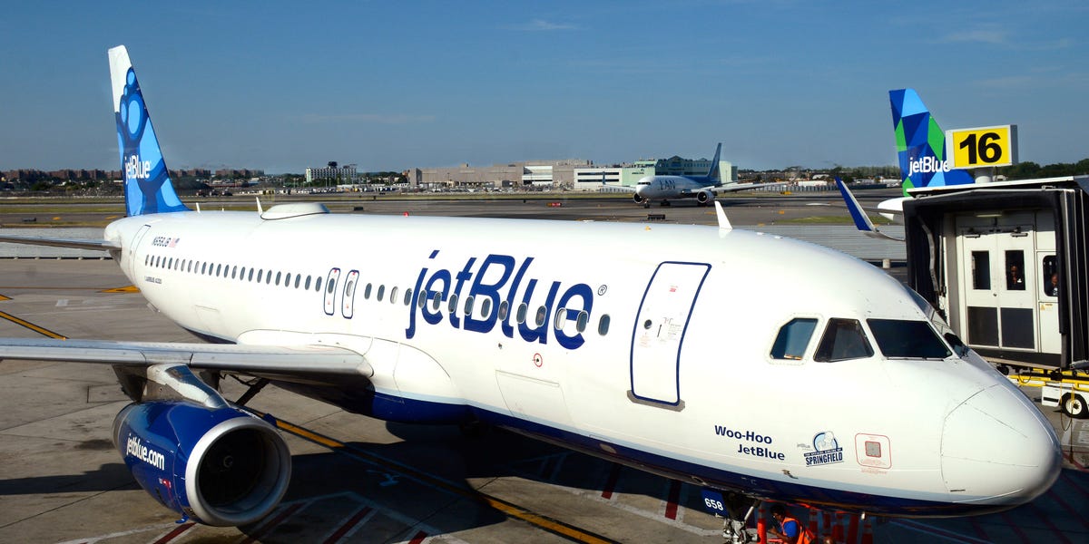 A JetBlue passenger opened the plane's emergency exit after reportedly arguing with his girlfriend